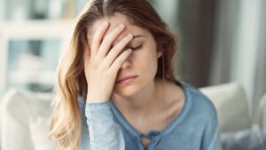 Woman with Head Ache