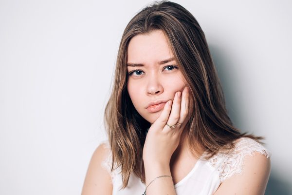 woman with tooth pain